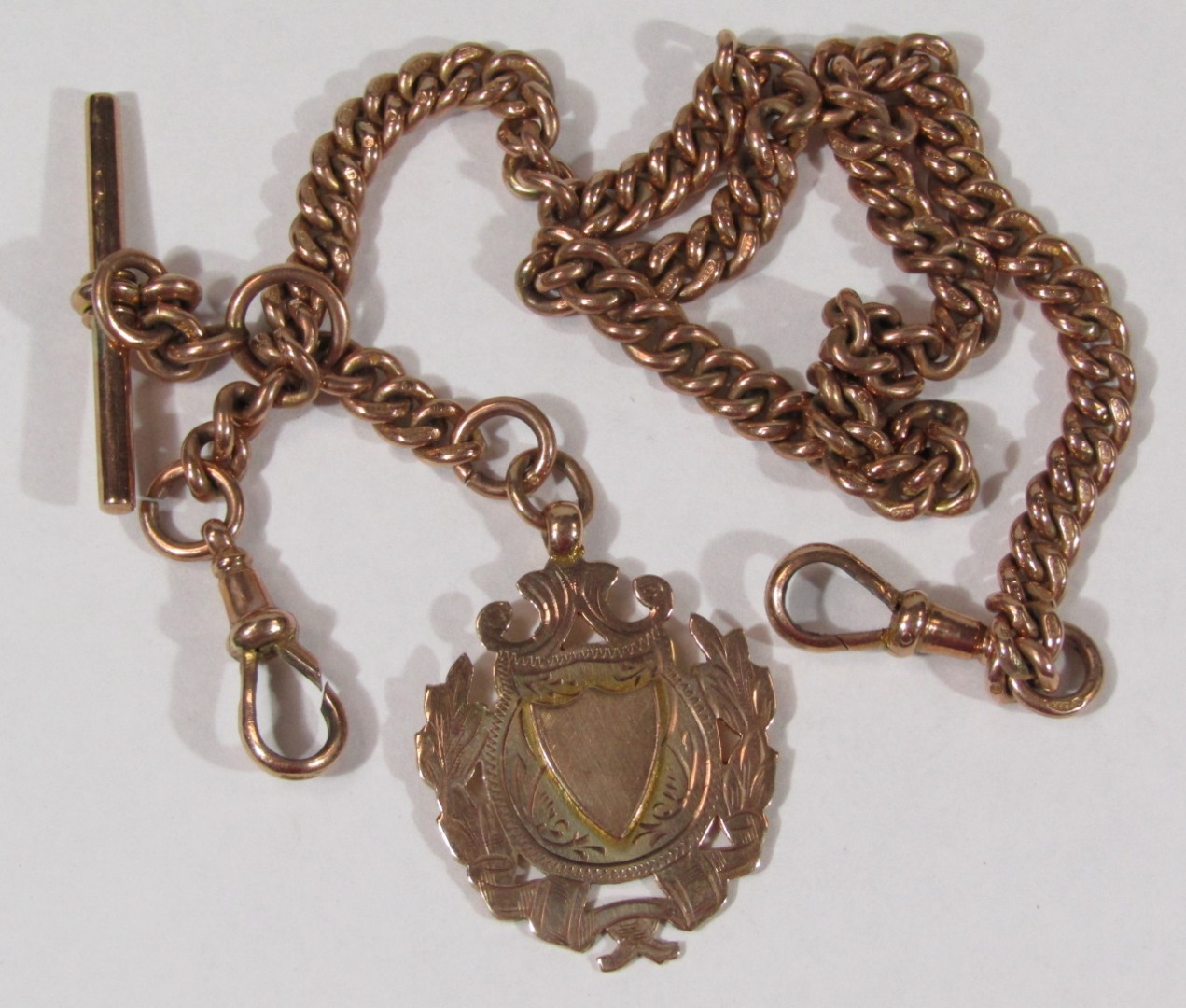 Appraisal: A ct gold heavy Albert and fob with swivel and