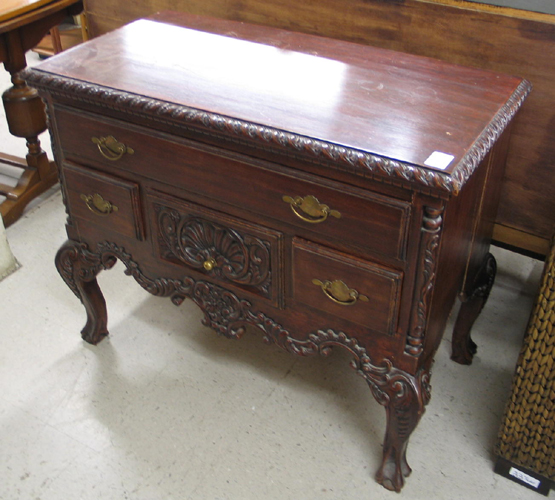 Appraisal: CHIPPENDALE STYLE MAHOGANY LOWBOY th century the front with one