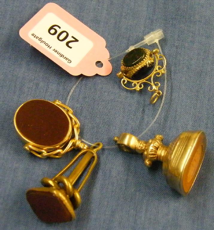 Appraisal: Two ct stone set swivel fob pendants pinchbeck fob seal