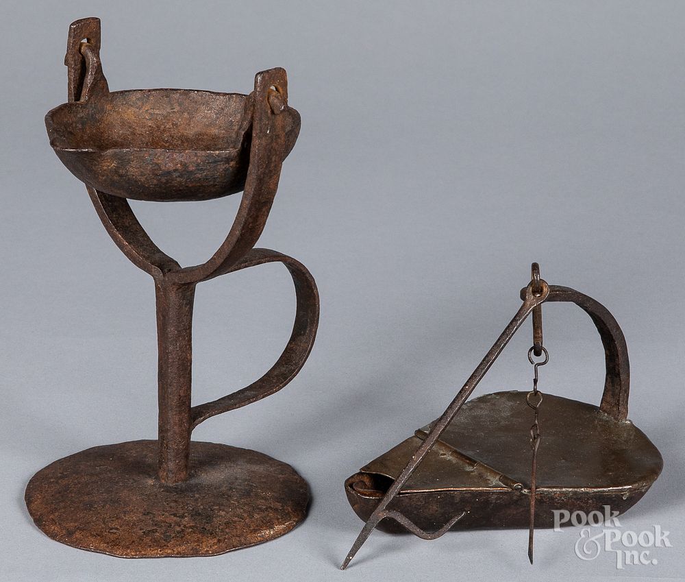 Appraisal: Two iron and copper fat lamps th th c Two