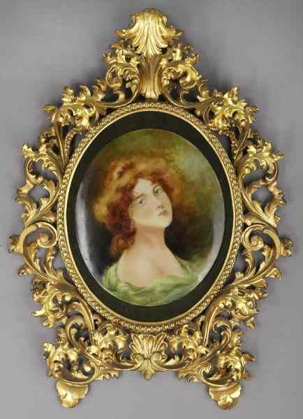 Appraisal: Italian Rococo style carved gilt wood frameenclosing a porcelain plaque