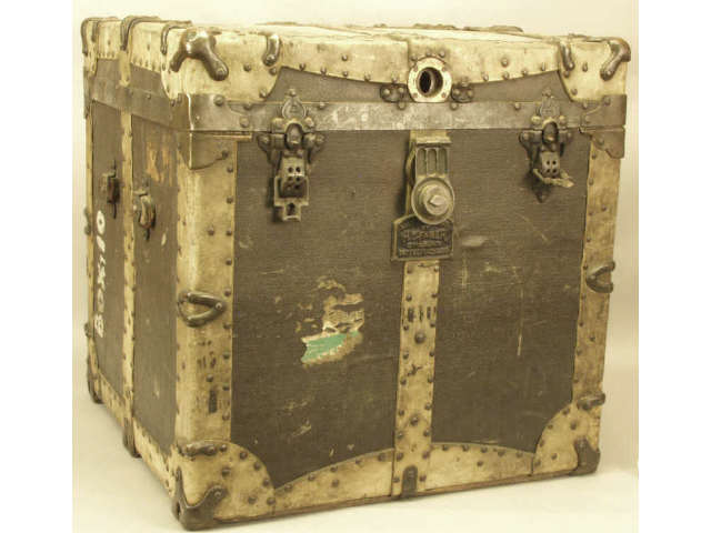 Appraisal: Neat antique rawhide bound traveling trunk with makers brass tag