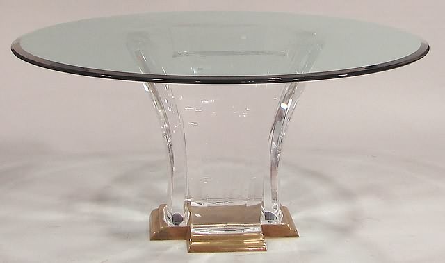 Appraisal: round beveled glass top supported by a four section Lucite