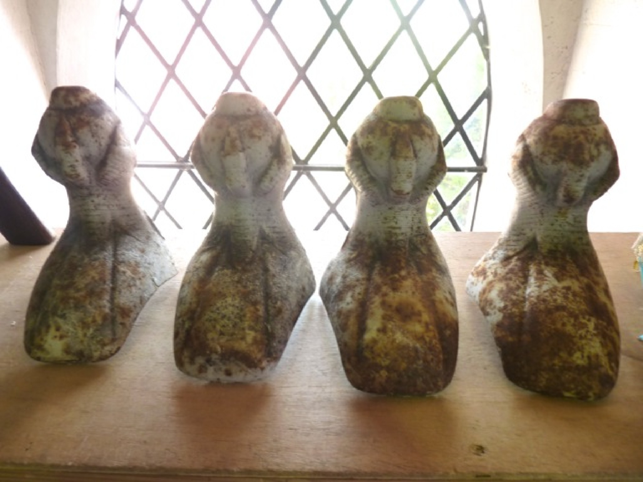 Appraisal: A set of four Victorian cast iron bath feet of