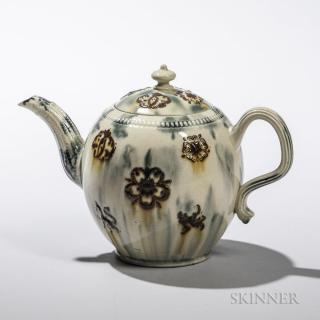 Appraisal: Staffordshire Translucent-glazed Cream-colored Earthenware Teapot and Cover England c reeded