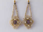 Appraisal: A pair of seed pearl and amethyst earrings amethysts approx