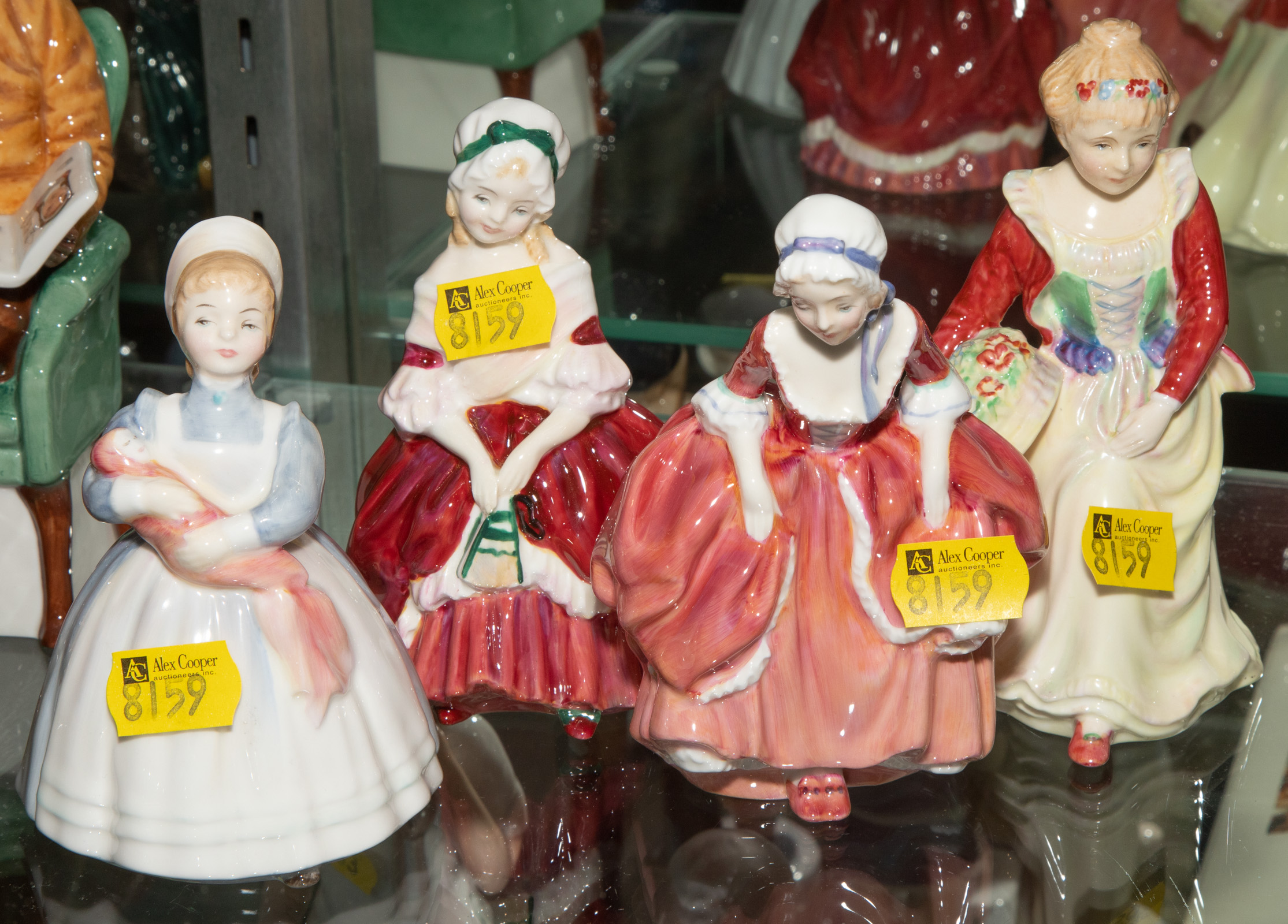 Appraisal: THREE ROYAL DOULTON FIGURES A PARAGON FIGURE Including The Rag