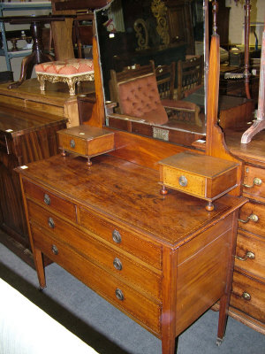 Appraisal: An Edwardian mirror back mahogany and inlaid dressing table with