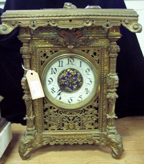 Appraisal: A Franco Indian mantel clock the pierced top with water