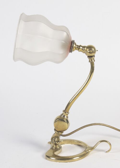 Appraisal: An Art Nouveau style brass table lamp with frosted faceted