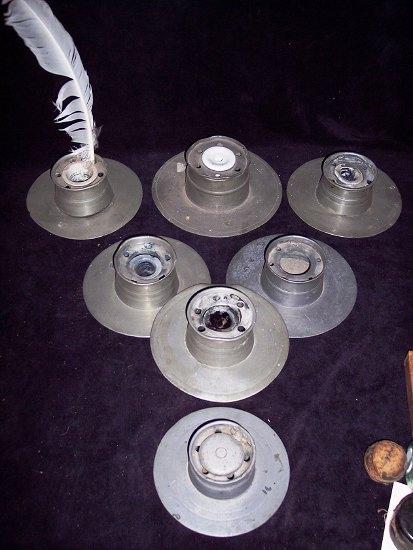 Appraisal: A collection of pewter inkstands of circular form