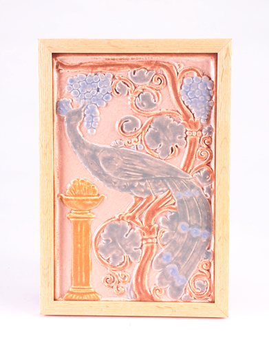 Appraisal: CALIFORNIA ART TILE Vertical tile embossed with a peacock perched