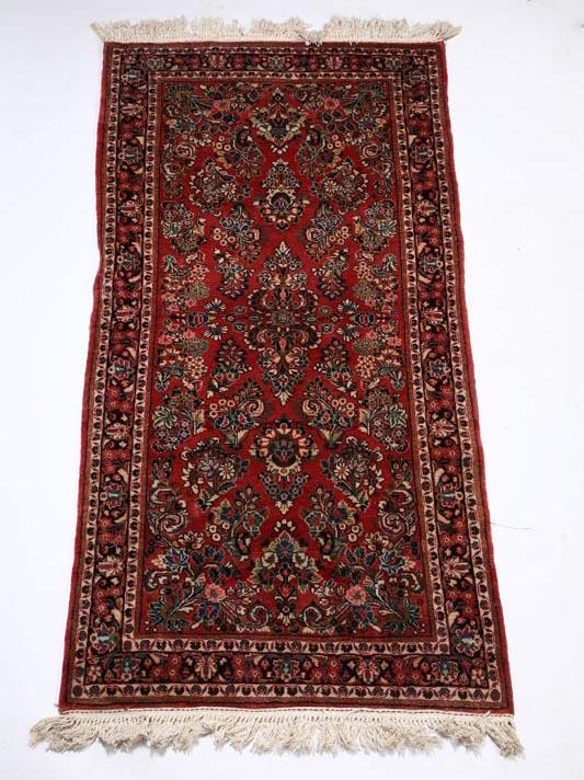 Appraisal: ORIENTAL RUG Sarouk mid th century Burgundy ground Added fringe