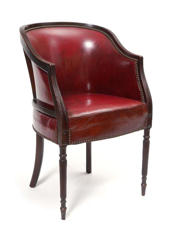 Appraisal: LEATHER BARREL SHERATON STYLE CHAIR Fluted top rail continues to