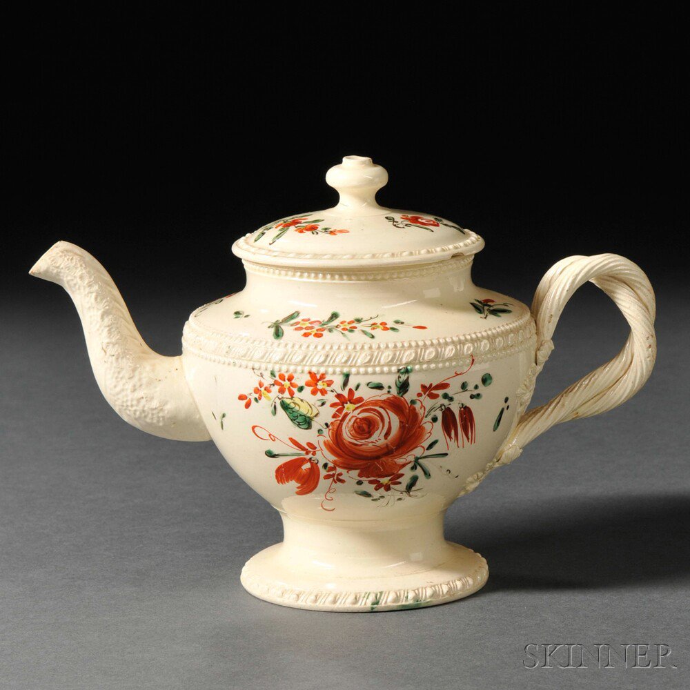 Appraisal: Staffordshire Cream-colored Earthenware Teapot and Cover England c leaf-molded spout