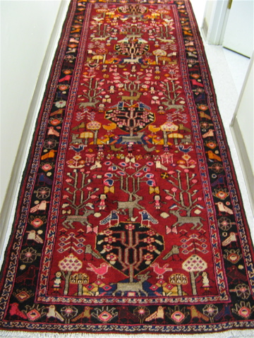 Appraisal: PERSIAN TRIBAL HALL RUG Hamadan Province northwestern Iran the red