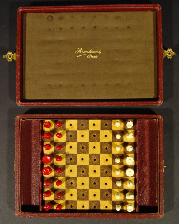 Appraisal: Leather cased travelling chess board with stained bone pieces the