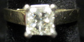 Appraisal: karat yellow gold diamond engagement ringProng set princess cut solitaire