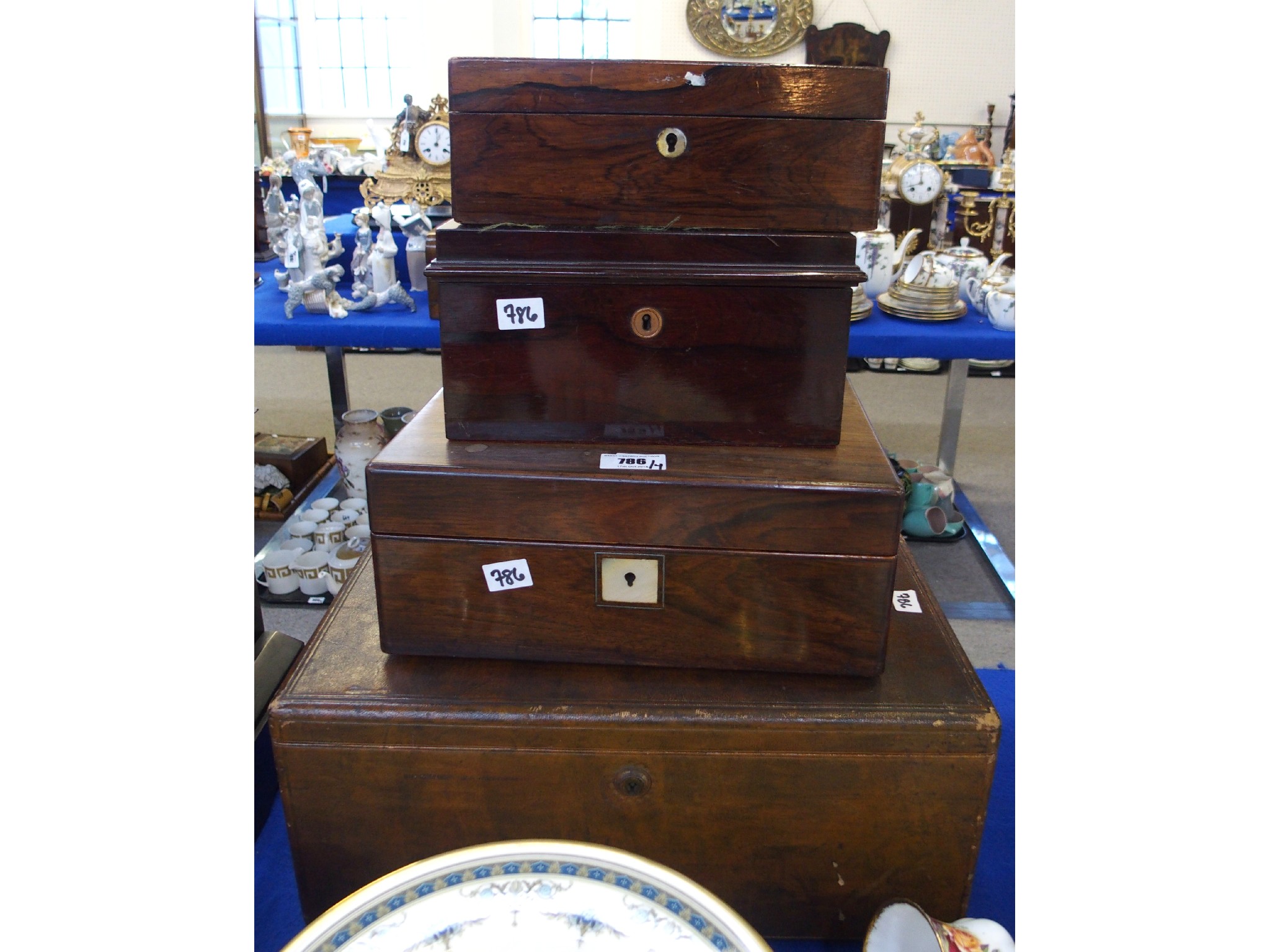 Appraisal: Three mahogany and one leather table caskets