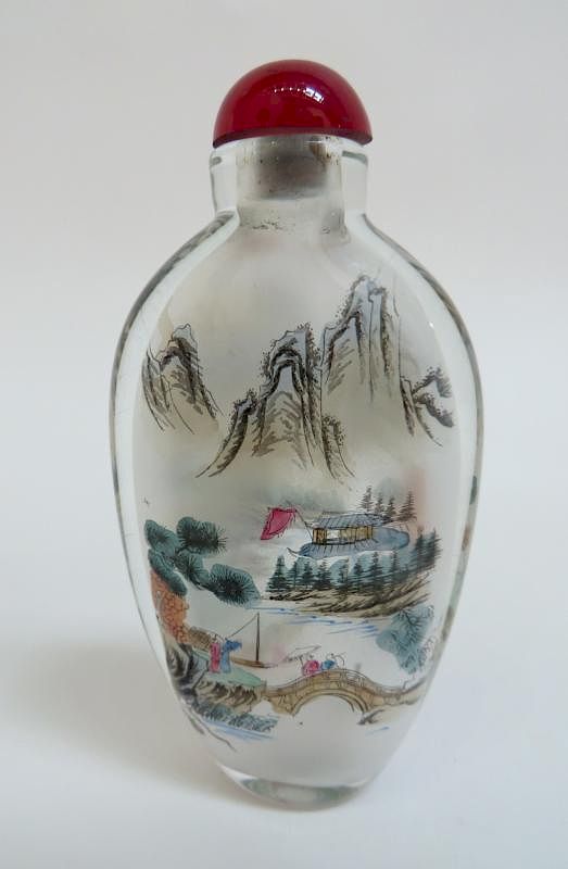 Appraisal: Qing Snuff Bottle Qing Snuff Bottle Description Clear glass with