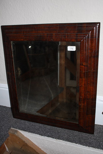 Appraisal: AN TH CENTURY CUSHION FRAME WALL MIRROR with later bevelled