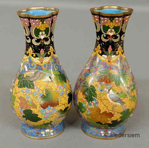 Appraisal: Pair of cloisonn vases th c with colorful bird and