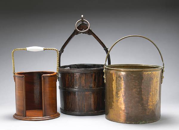 Appraisal: An English mahogany plate bucket brass log bucket and iron