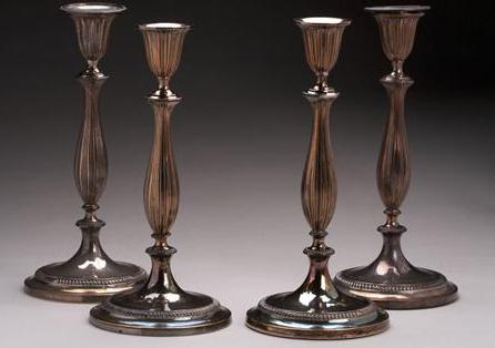 Appraisal: SET OF FOUR REGENCY SHEFFIELD PLATE CANDLESTICKS CIRCA - Each