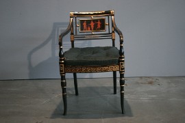 Appraisal: A th century style ebonised and carved armchair with gilt