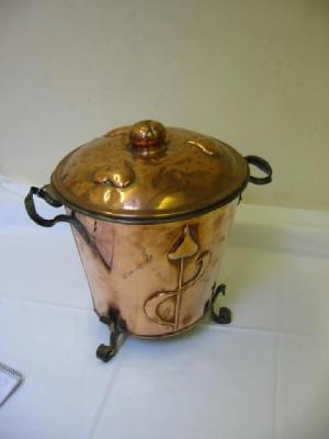 Appraisal: AN ARTS AND CRAFTS COPPER BUCKET with wrought iron loop