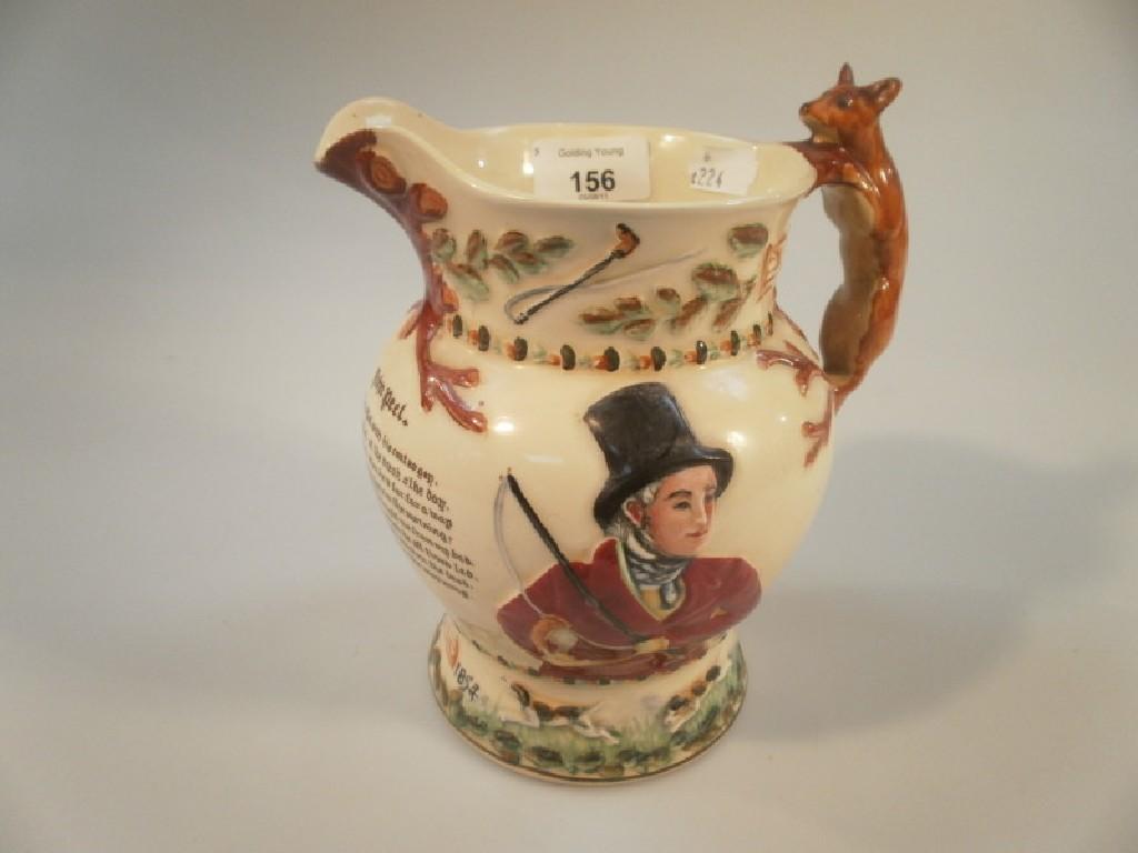 Appraisal: A Crown Devon moulded pottery musical John Peel hunting jug