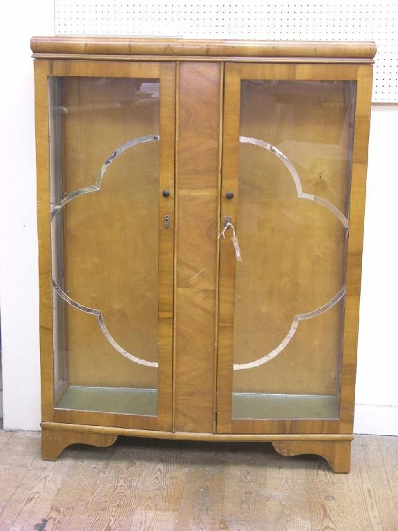 Appraisal: An Art Deco walnut veneered display cabinet the pair of