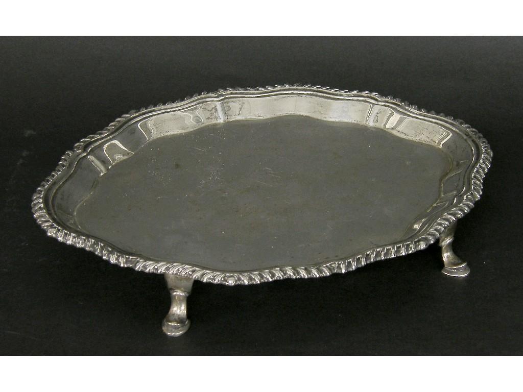 Appraisal: s silver serpentine oval waiter with gadrooned rim and splayed