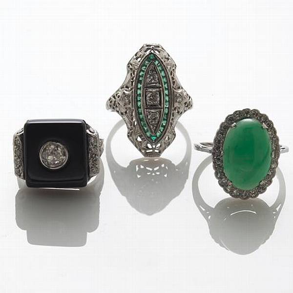 Appraisal: A collection of three diamond black onyx emerald jade platinum