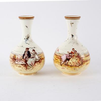 Appraisal: A pair of English porcelain vases with slender necks transfer