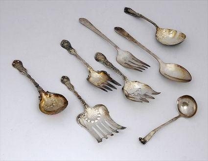 Appraisal: EIGHT AMERICAN MONOGRAMMED SILVER FLATWARE SERVING ARTICLES Comprising Whiting Mfg