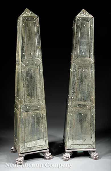 Appraisal: A Pair of Decorative Mirrored Obelisks on silvered square pedestals