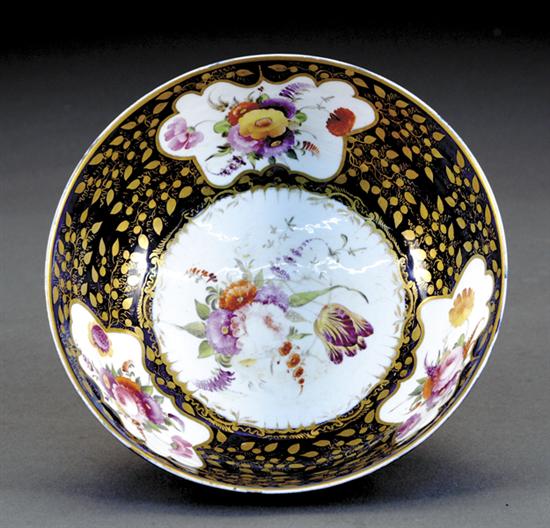 Appraisal: Worcester porcelain punch bowl th centurycartouche painted with floral sprigs