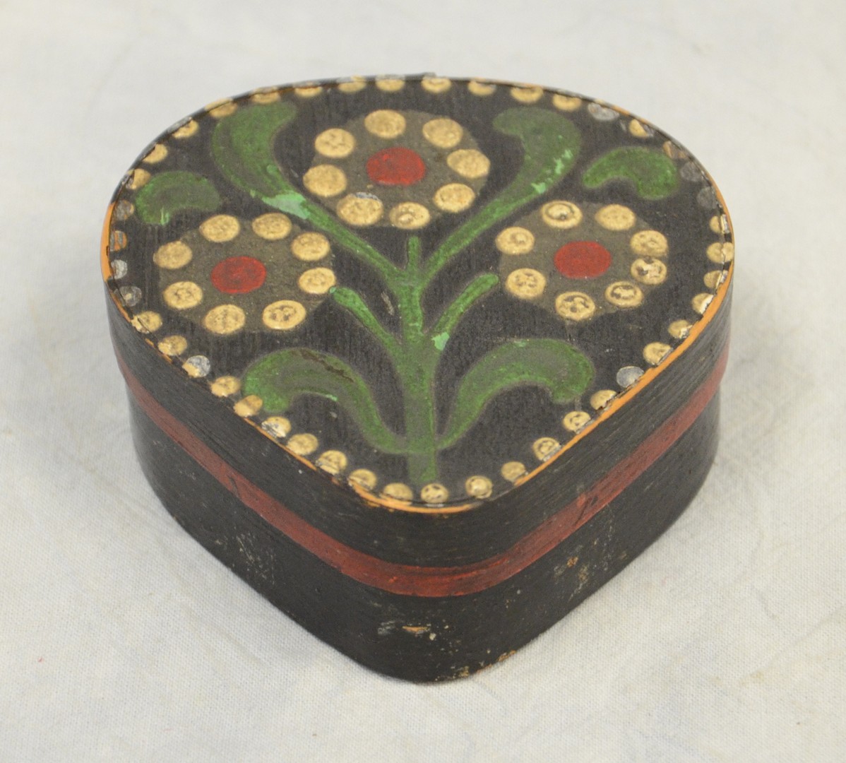 Appraisal: Paint decorated wood heart shaped box c could be Scandinavian