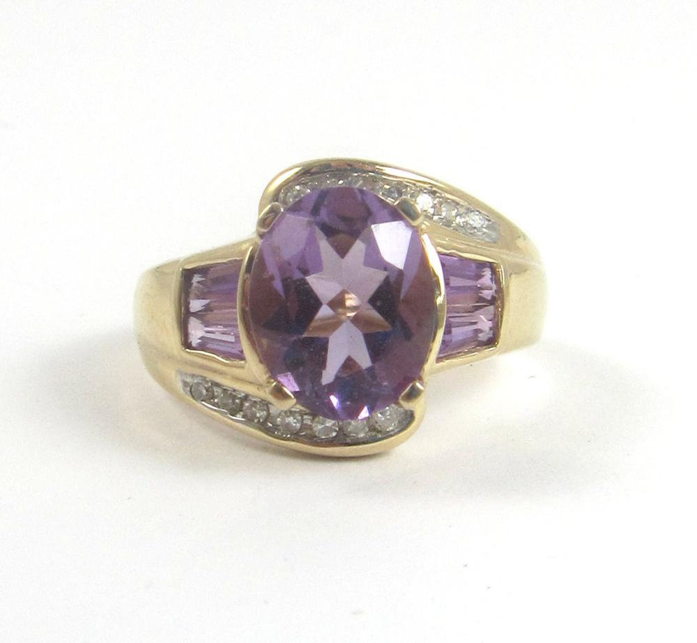 Appraisal: AMETHYST DIAMOND AND FOURTEEN KARAT GOLD RING set with round