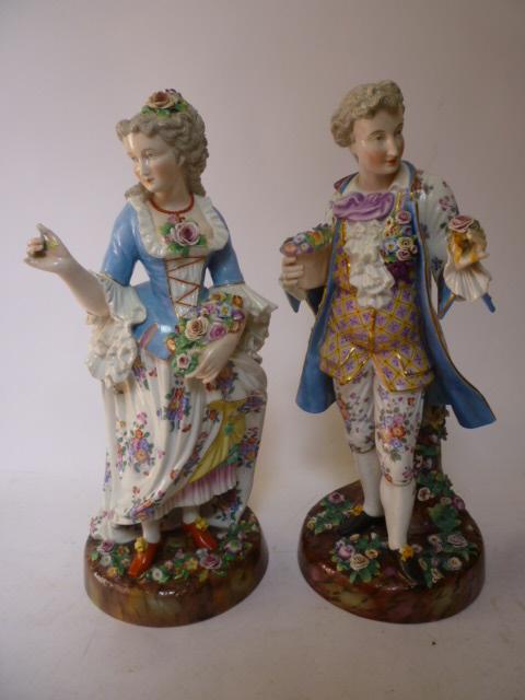 Appraisal: A PAIR OF CONTINENTAL FIGURAL LAMP BASES c modelled as