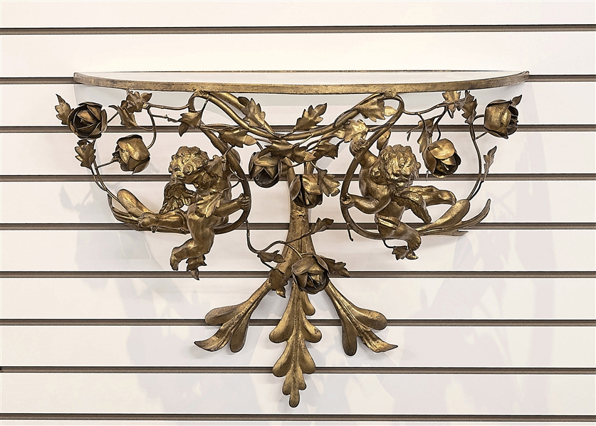 Appraisal: Brass Italian bracket with cherubs roses glass top L