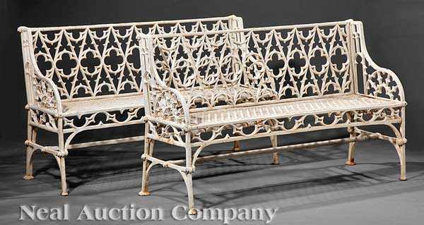 Appraisal: A Pair of Gothic-Style Cast Iron Garden Benches pierced back