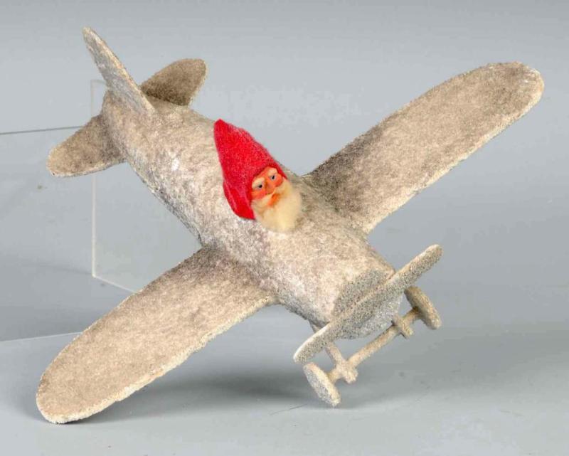 Appraisal: Santa Claus in Airplane Candy Container Description Has mica finish