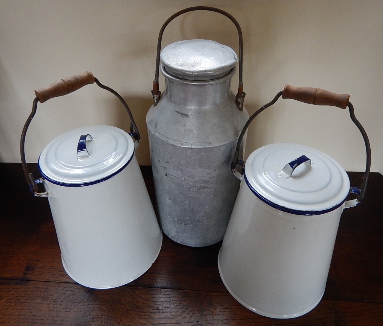 Appraisal: Two enamelled milk pails and an aluminium milk pail