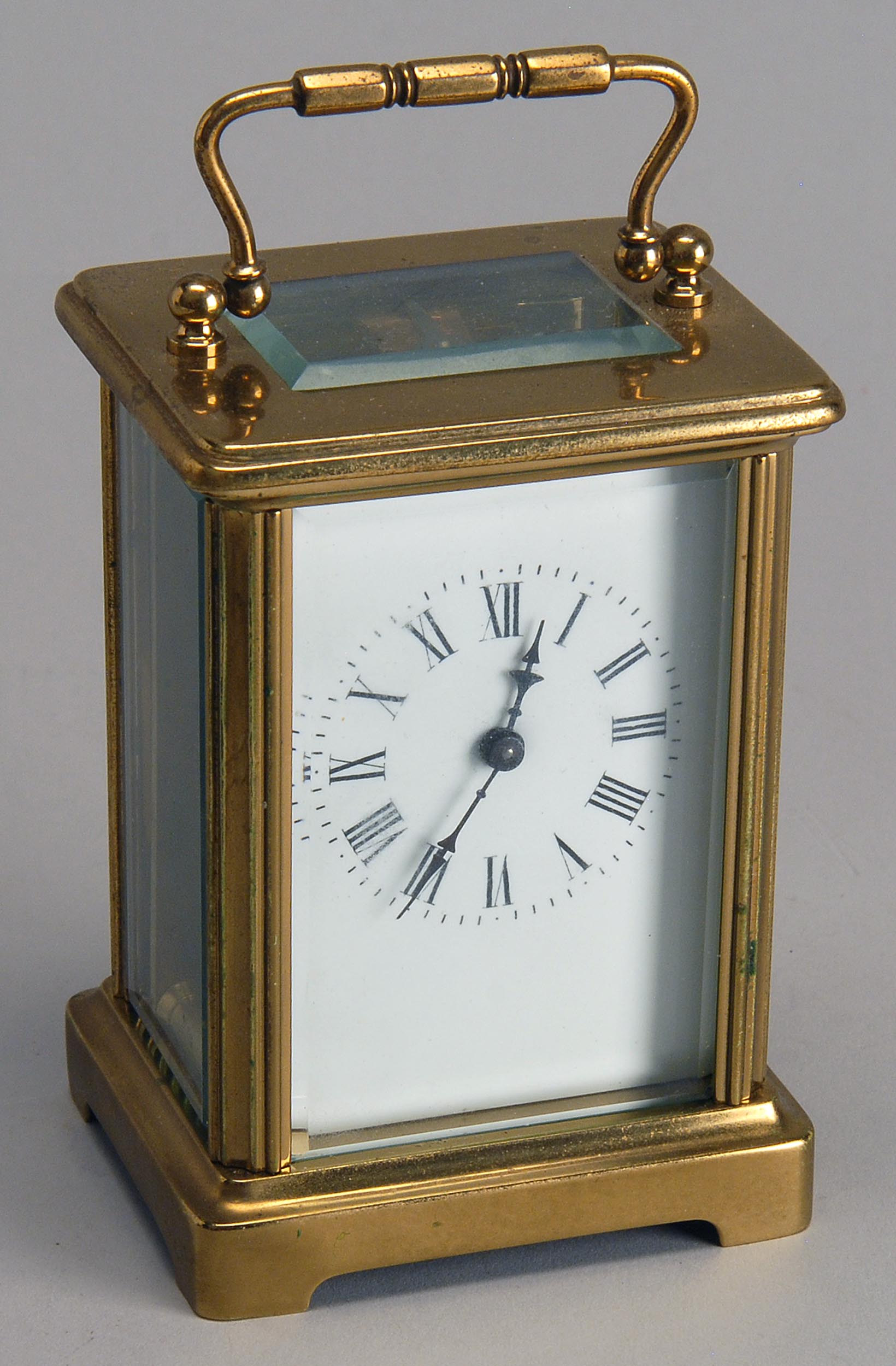 Appraisal: FRENCH BRASS CARRIAGE CLOCK with beveled glass Height ConditionNot guaranteed