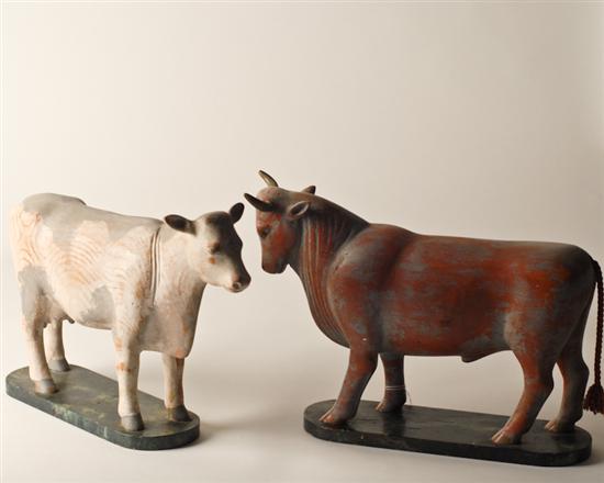 Appraisal: Pair of Wooden Figures Bull and Cow high