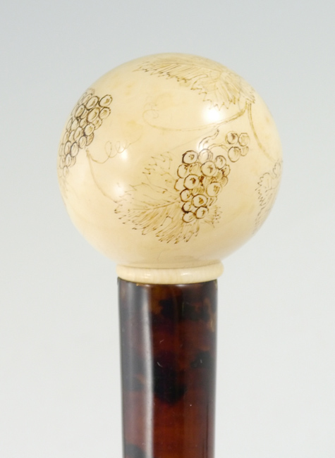 Appraisal: IVORY TORTOISE SHELL WALKING STICK OR CANE HANDLE Ball form