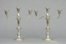 Appraisal: A Pair of Interchangeable Candelabra Three light candelabra can be