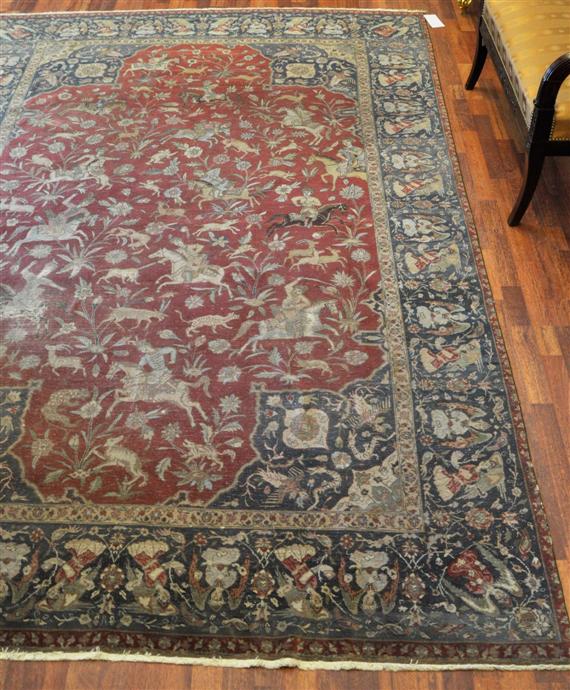 Appraisal: ISFAHAN antique Red central field with blue corner motifs patterned